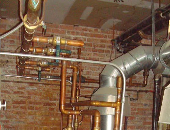 Uninsulated hot water heating pipes