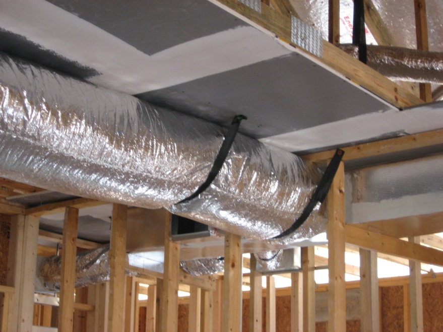 Duct work is strapped to the chase ceiling