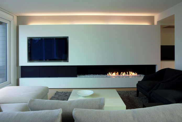 камин и телевизор в интерьере гостиной в стиле минимализм