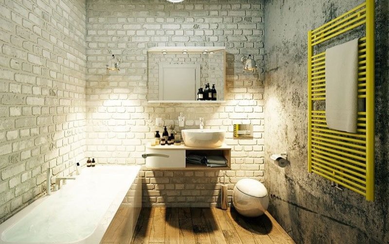 Желтый полотенцесушитель в ванной лофт стиля