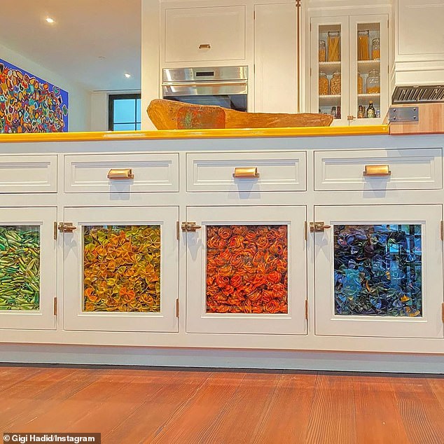 Tasty!: She livened up the room with display cabinets on her island that were filled with dyed decorative past in multiple colors, created by Linda Miller Nicholson