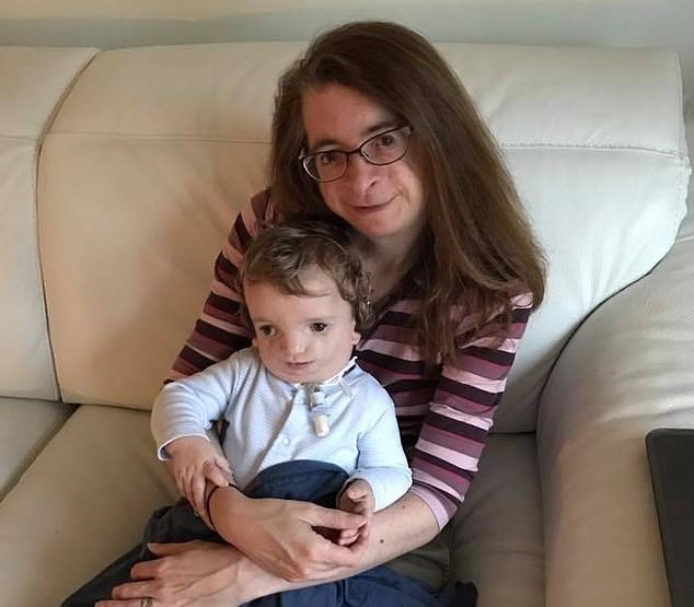 Victoria (pictured with her son Ryan) is calling on the government to adjust the current guidelines preventing her son from starting Primary School