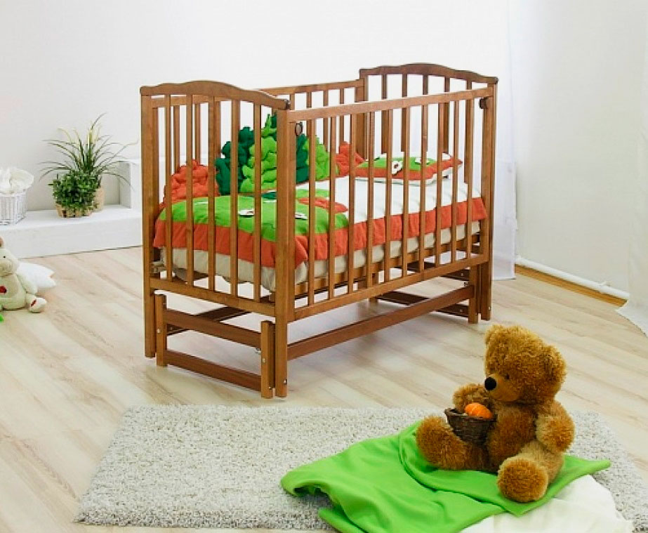 Маятниковая кровать для новорожденных
