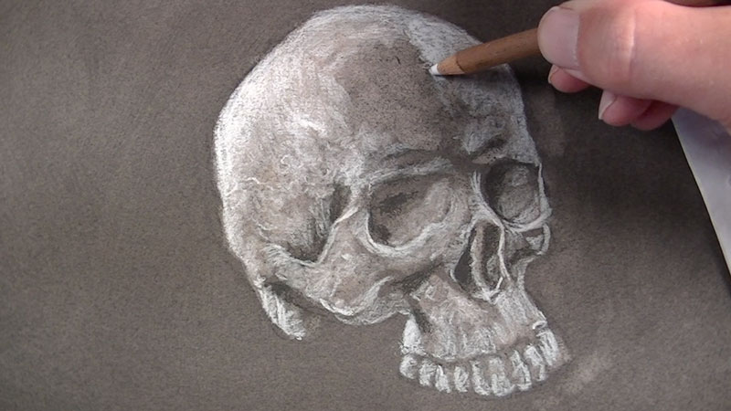 Continue applying white charcoal in highlighted areas.