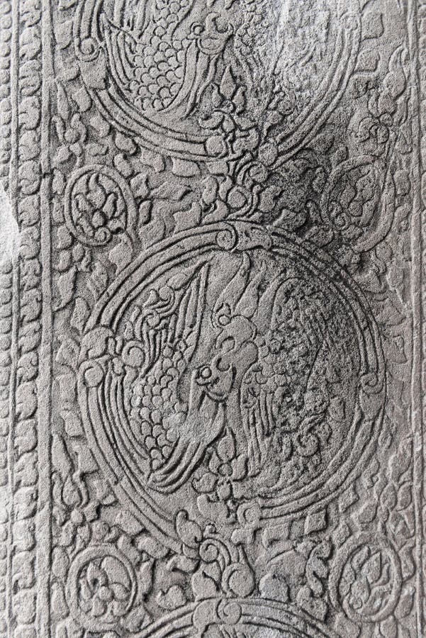 Ancient stone carving with floral and birds decorative ornament stock images
