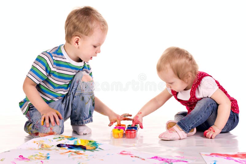 Little children are drawing with hands stock photography