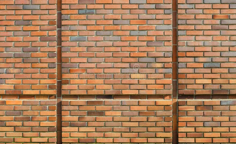 Red and orange brick wall with cement clay background. Red and orange brick wall with cement clay in six blocks background stock photos