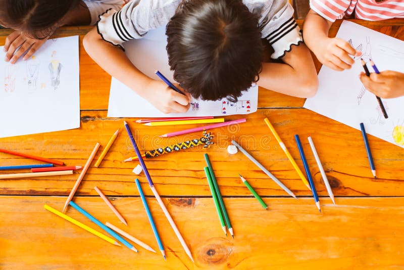 Top view of group asian children drawing and painting stock photography