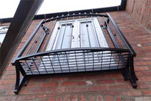 photo: small platform steel balcony