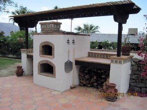 Brick oven with gas fireplace under
